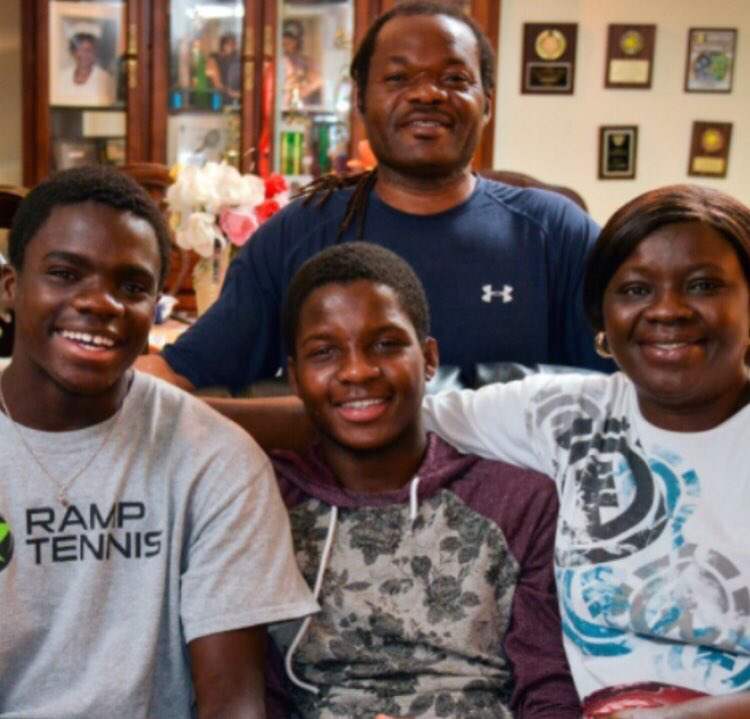 Frances Tiafoe with his parents and brother