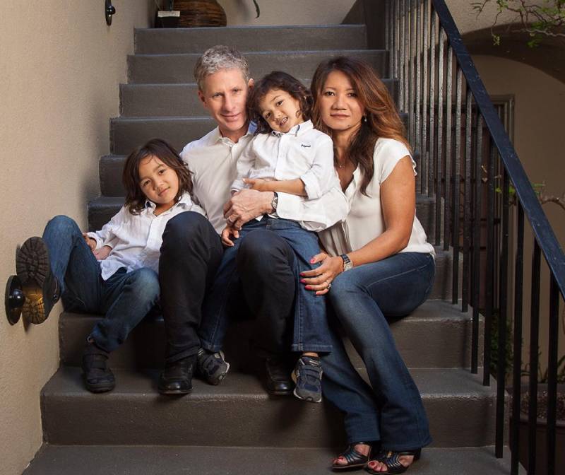 Chris Larsen with his wife and two sons