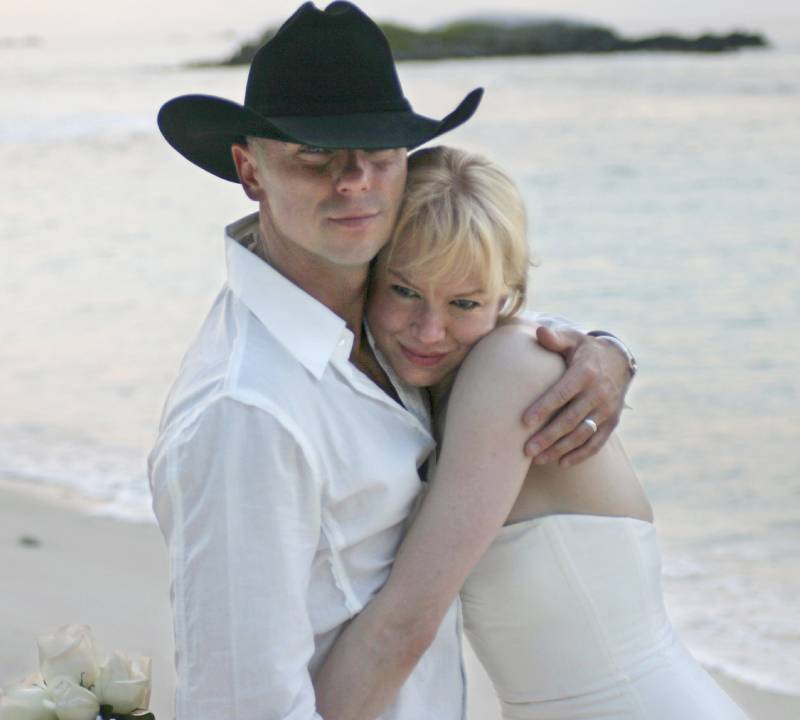 Kenny Chesney and his ex-wife RenÃ©e Zellweger