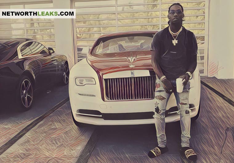 Offset (Migos) standing next to his Rolls Royce